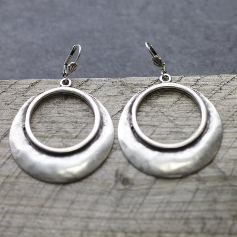 Zilveren bloemoorbellen met turquoise steen