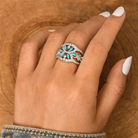 Zilveren ring met turquoise blaadjes en zirkonia