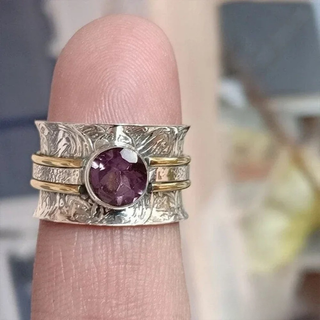 Zilveren spinner ring met paarse amethist