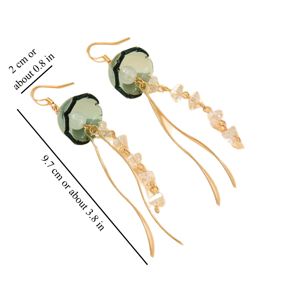 Gouden tassel oorbellen met groene glazen steen