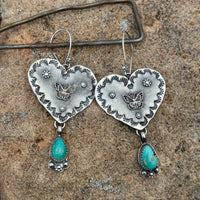 Zilveren vintage oorbellen met turquoise filigrein