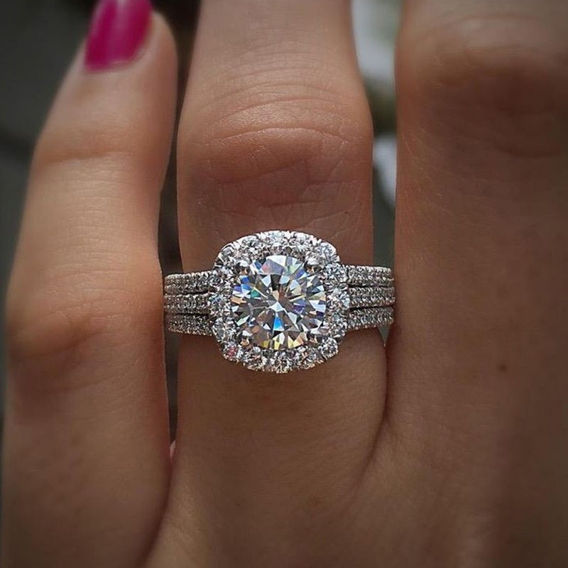 Zilveren halo-ring met ronde zirkonia