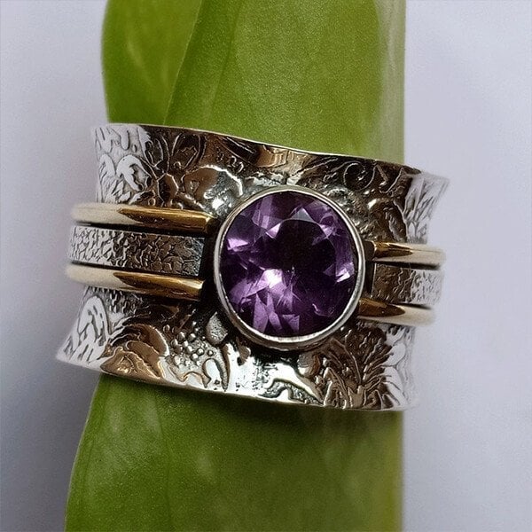 Zilveren spinner ring met amethist