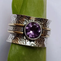 Zilveren spinner ring met amethist