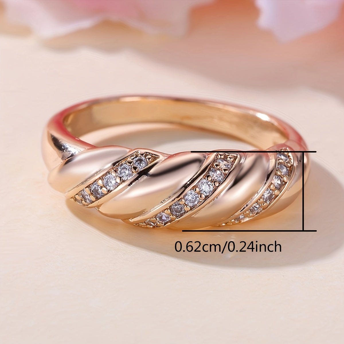 Roségouden gedraaide ring met zirkonia
