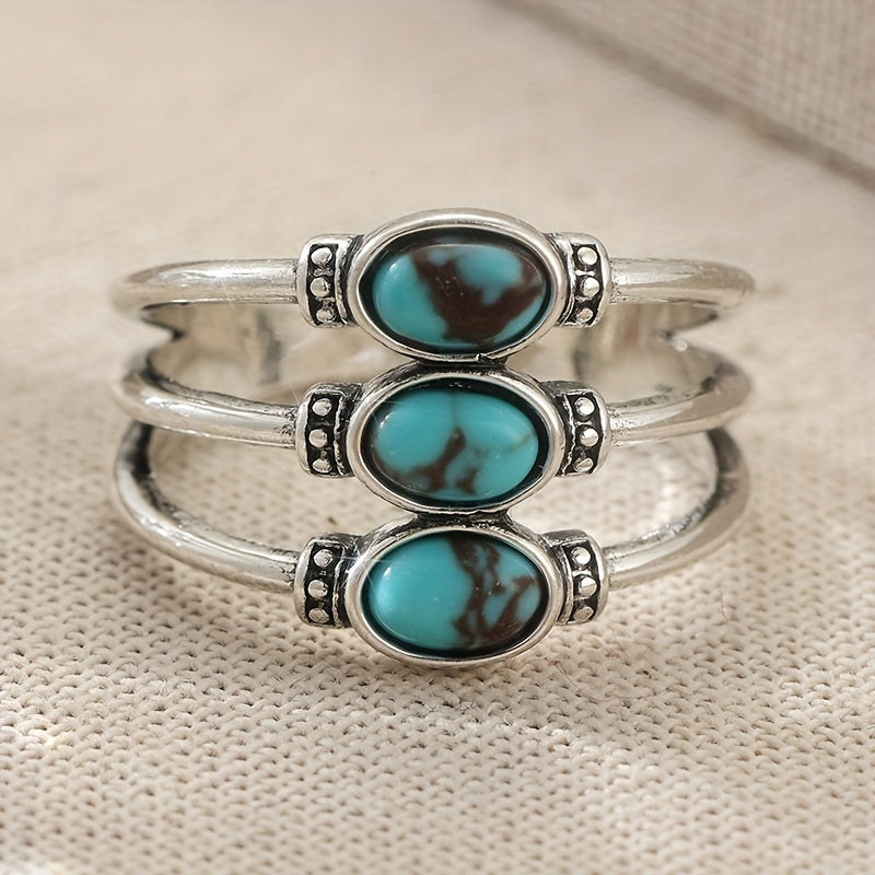 Zilveren bohemian ring met drie turquoise stenen