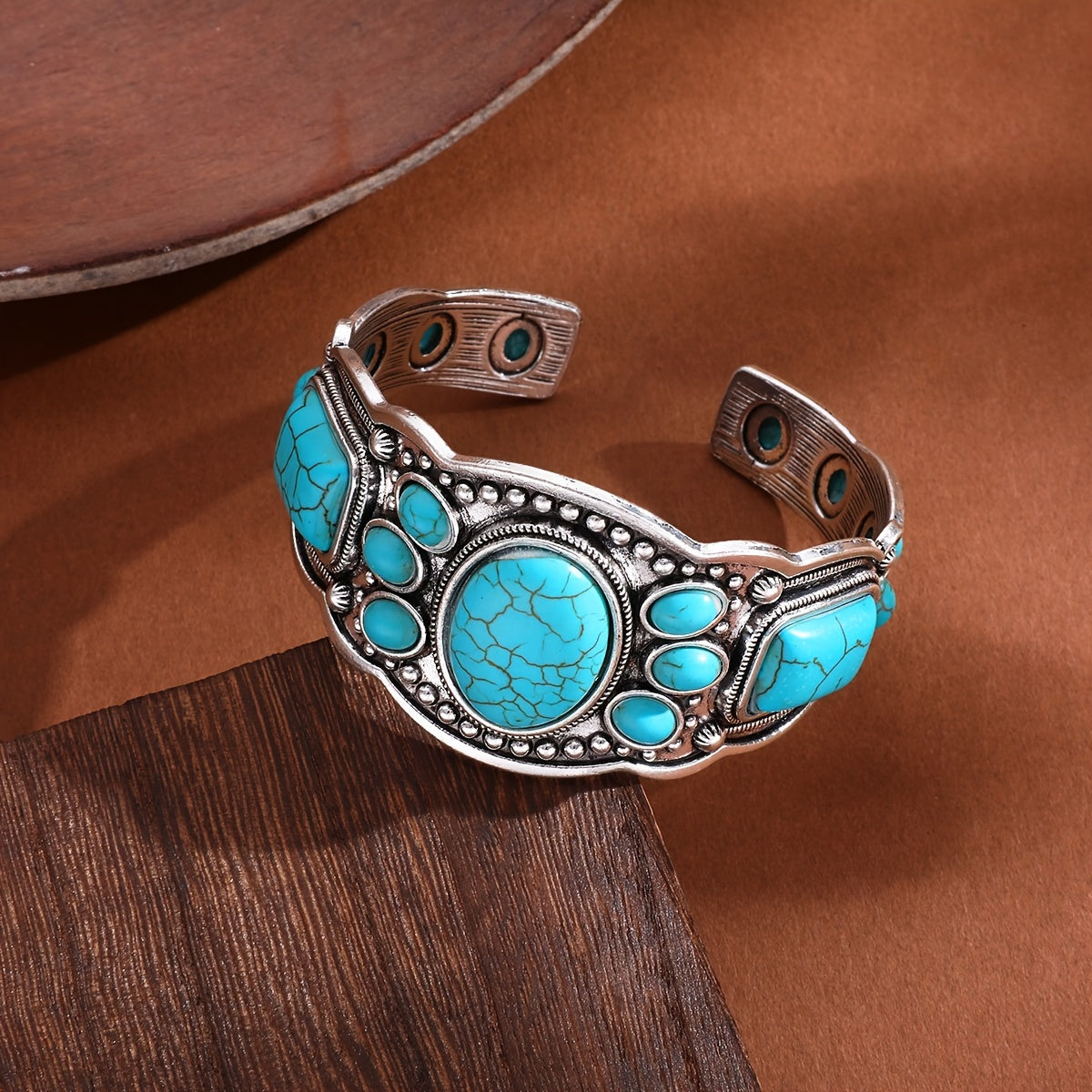 Gouden oorbellen met turquoise druppelsteen