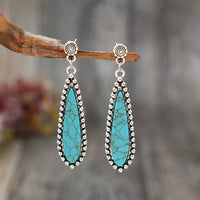 Zilveren western oorbellen met turquoise druppel
