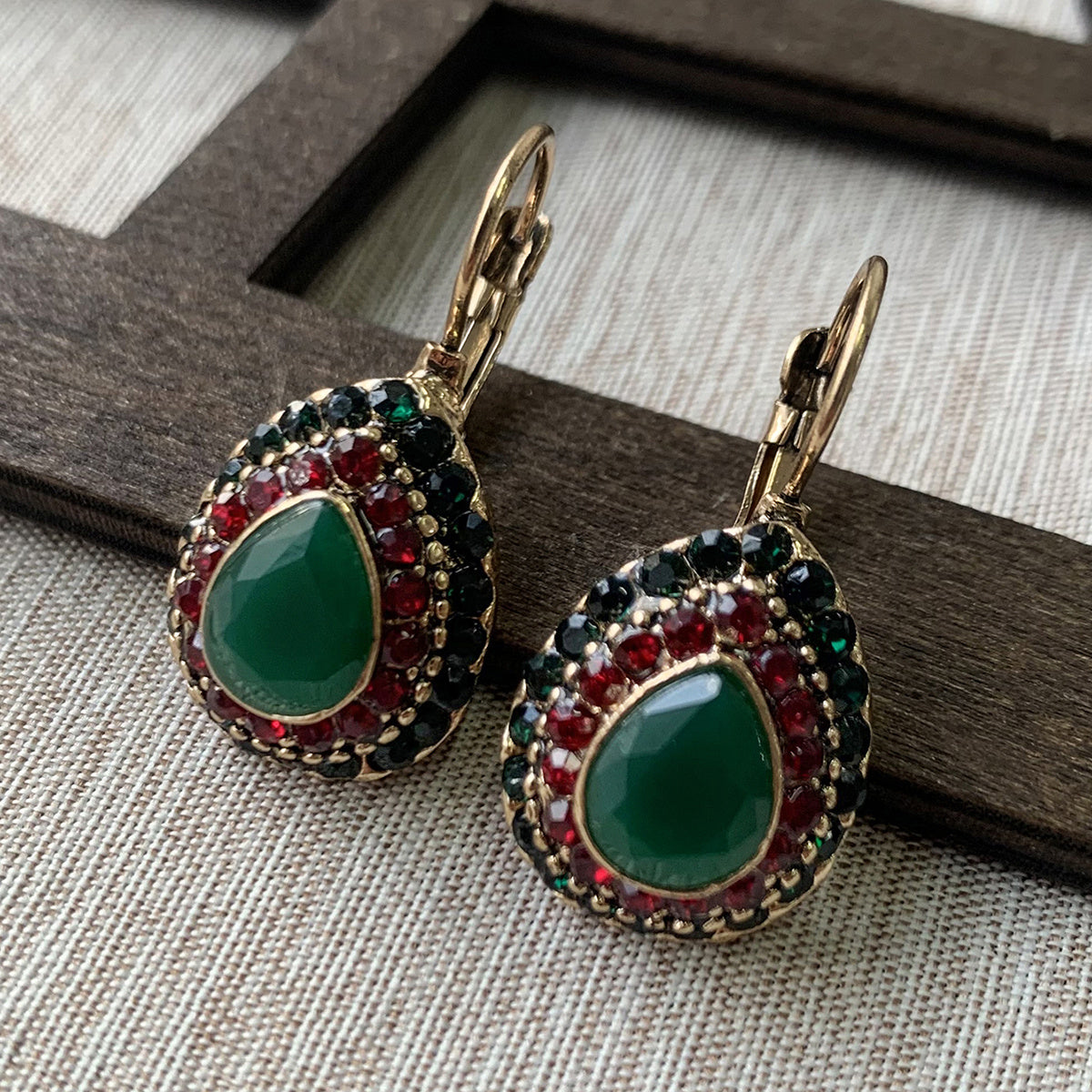 Bohemian bronzen oorbellen met turkoois en rode strass