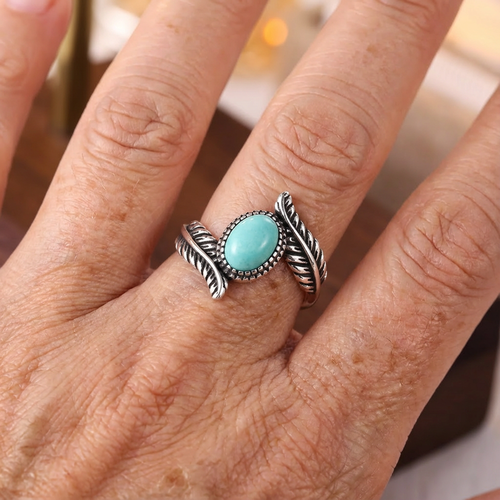 Zilveren ring met veer en turquoise