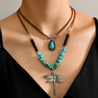 Bohemian dubbellaagse ketting met turkooizen kralen en libelle