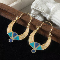 Bohemian oorbellen met turquoise halvemaan en kralen