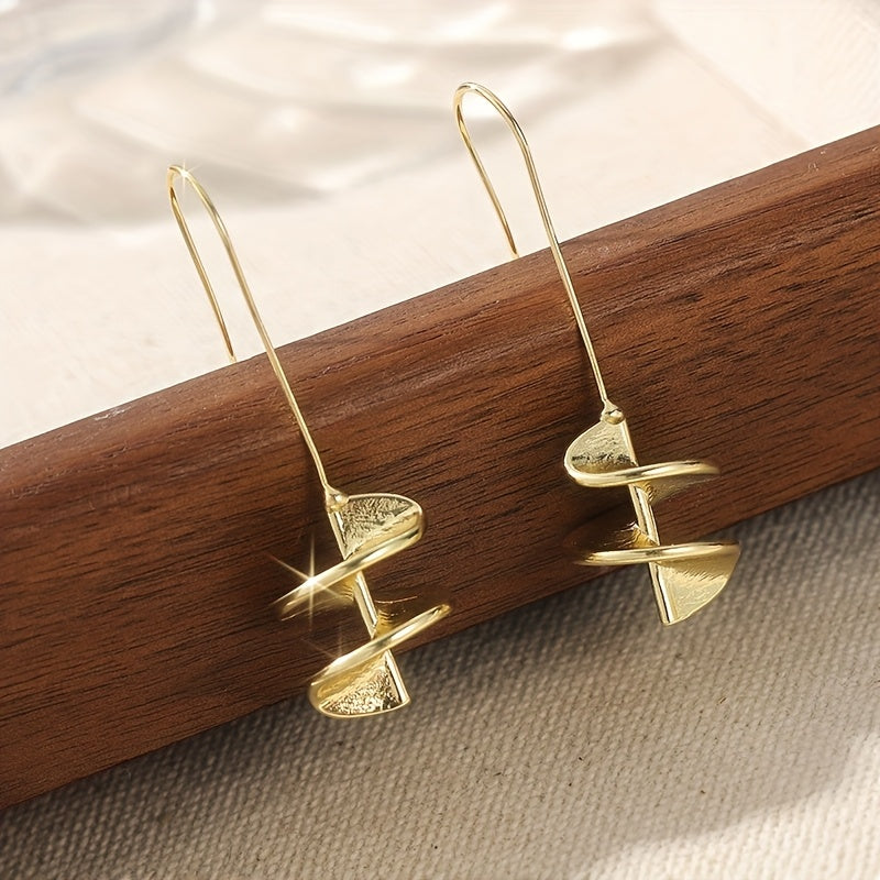 Gouden statement oorbellen met blad motief
