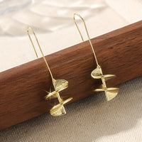 Gouden statement oorbellen met blad motief
