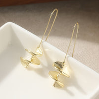 Gouden statement oorbellen met blad motief