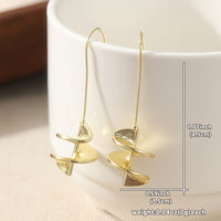 Gouden statement oorbellen met blad motief
