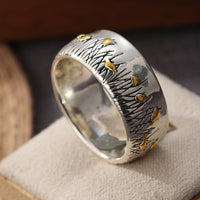 Zilveren vintage ring met gouden vogels en bladeren