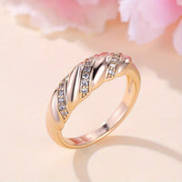 Roségouden gedraaide ring met zirkonia