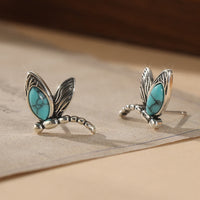 Zilveren oorbellen met libelle en turquoise