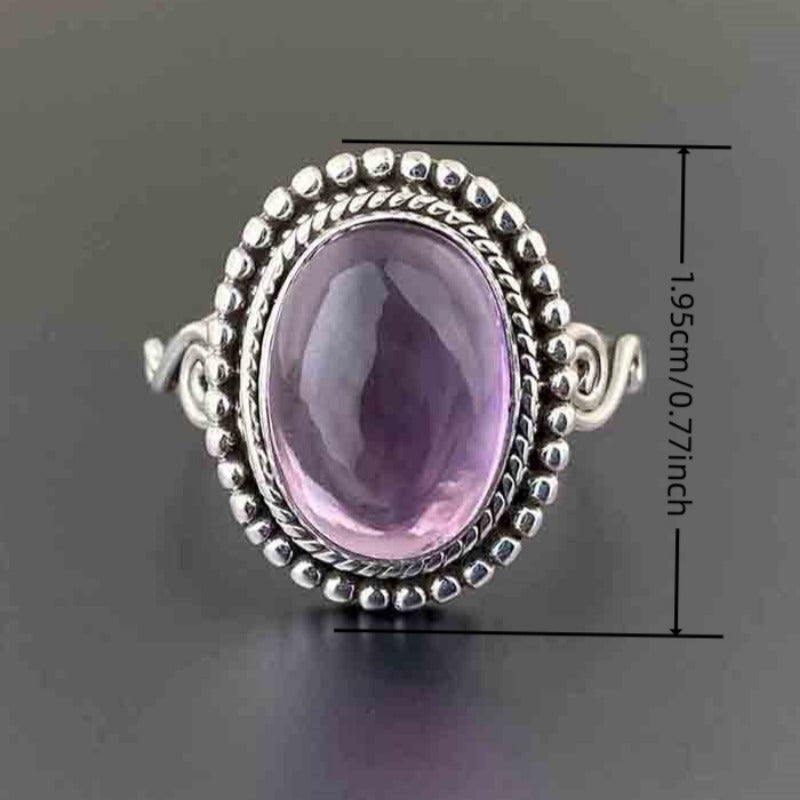 Zilveren vintage ring met ovale roze edelsteen