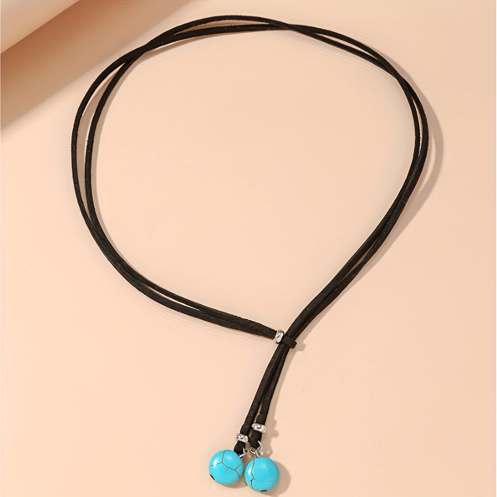 Bohemian lariat ketting van zwart koord met turkooizen kralen