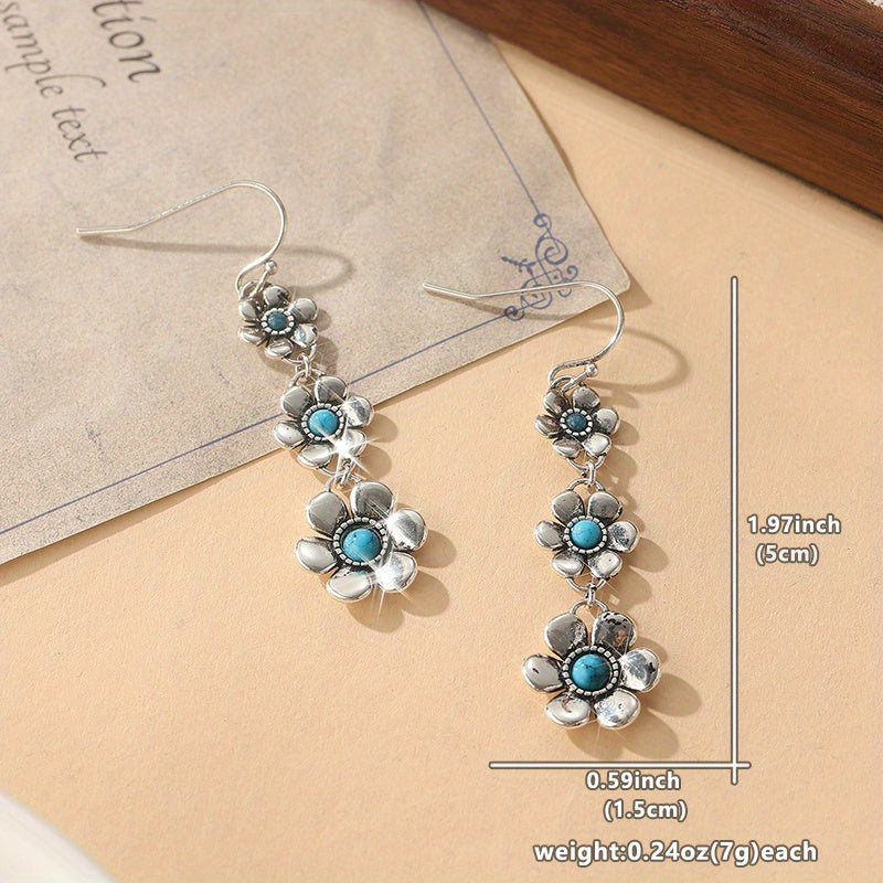 Zilveren bohemian bloemenoorbellen met turquoise