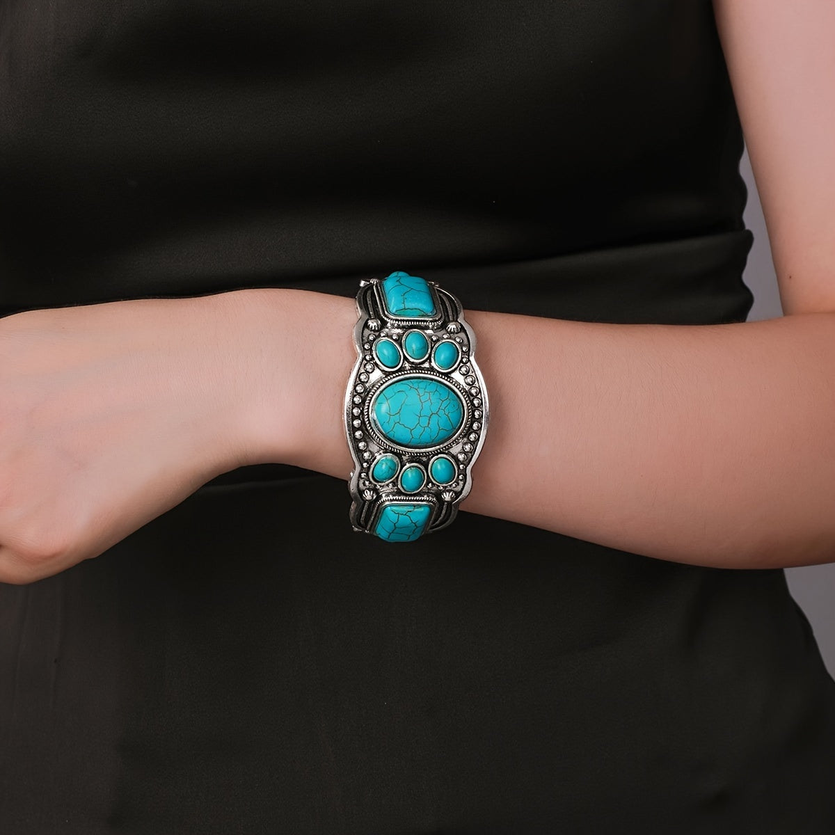 Gouden oorbellen met turquoise druppelsteen
