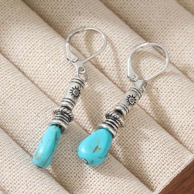 Zilveren etnische oorbellen met turquoise druppel