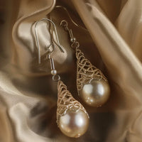 Vintage pareloorbellen met gouden filigraan
