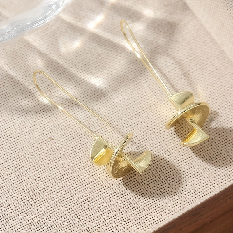 Gouden statement oorbellen met blad motief