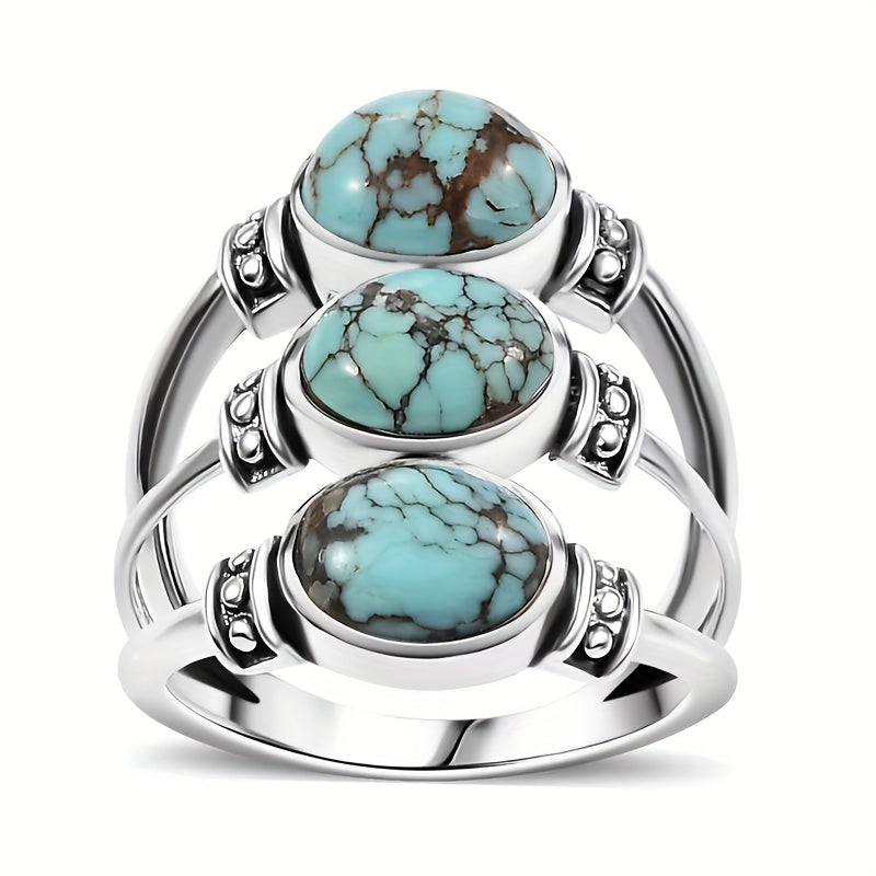 Zilveren bohemian ring met drie turquoise stenen