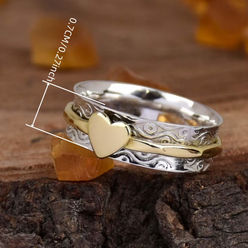 Zilveren spinner ring met gouden hart