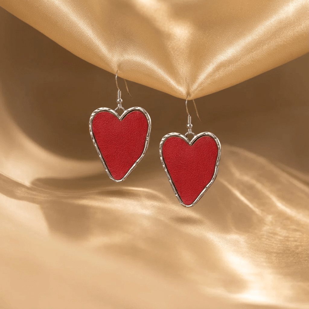 Zilveren oorbellen met rood hart