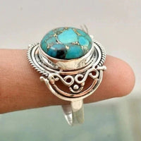 Zilveren ring met turquoise edelsteen en filigrein