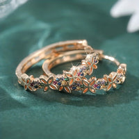 Driekleurige gouden creolen met diamantgeslepen patroon