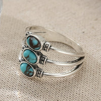 Zilveren bohemian ring met drie turquoise stenen