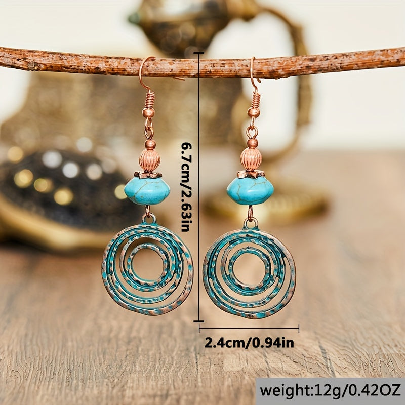 Bohemian oorbellen met roségoud spiraal en turquoise