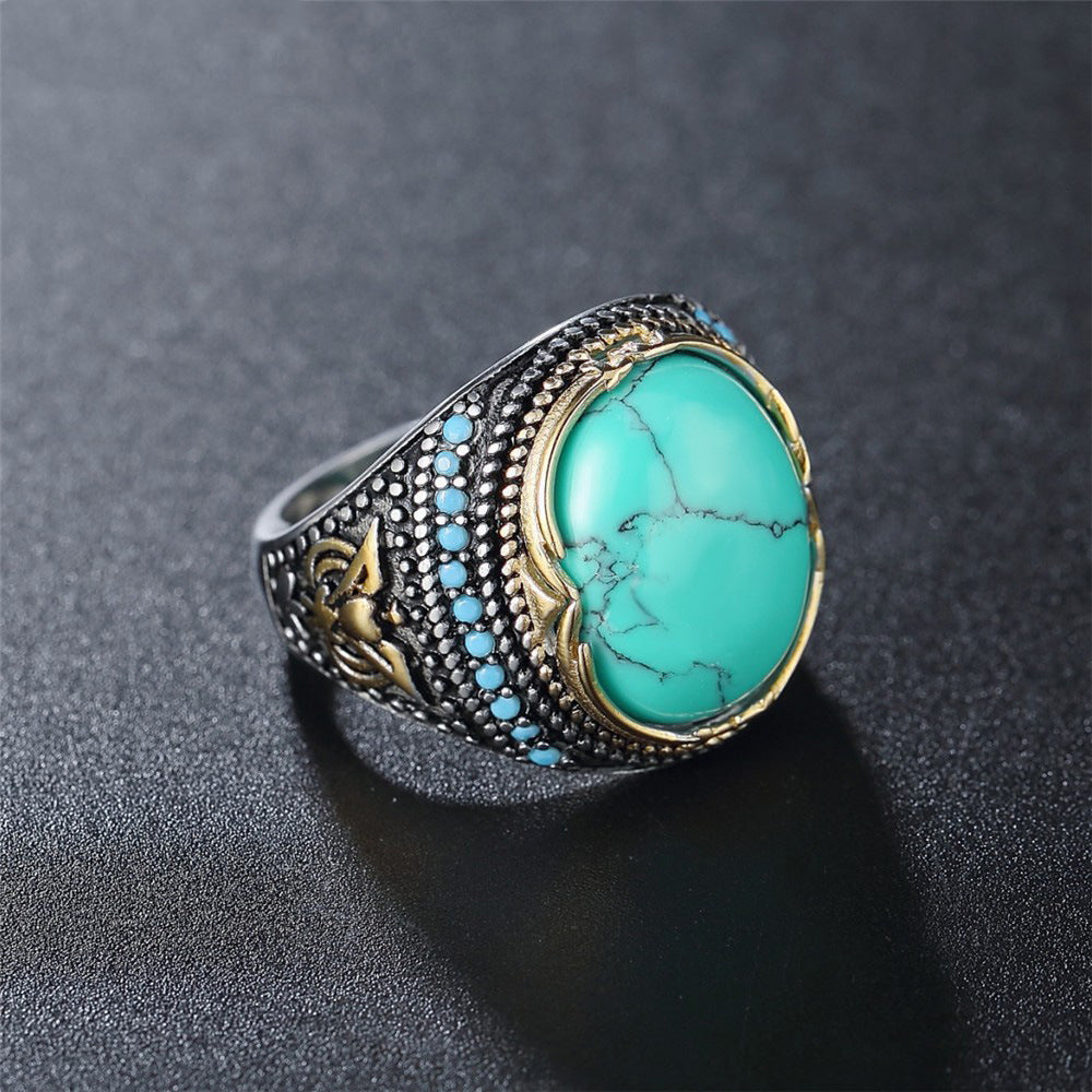 Zilveren vintage ring met grote turquoise steen