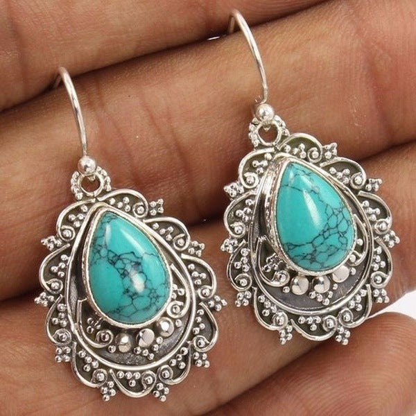 Zilveren vintage filigraan oorbellen met turquoise druppel