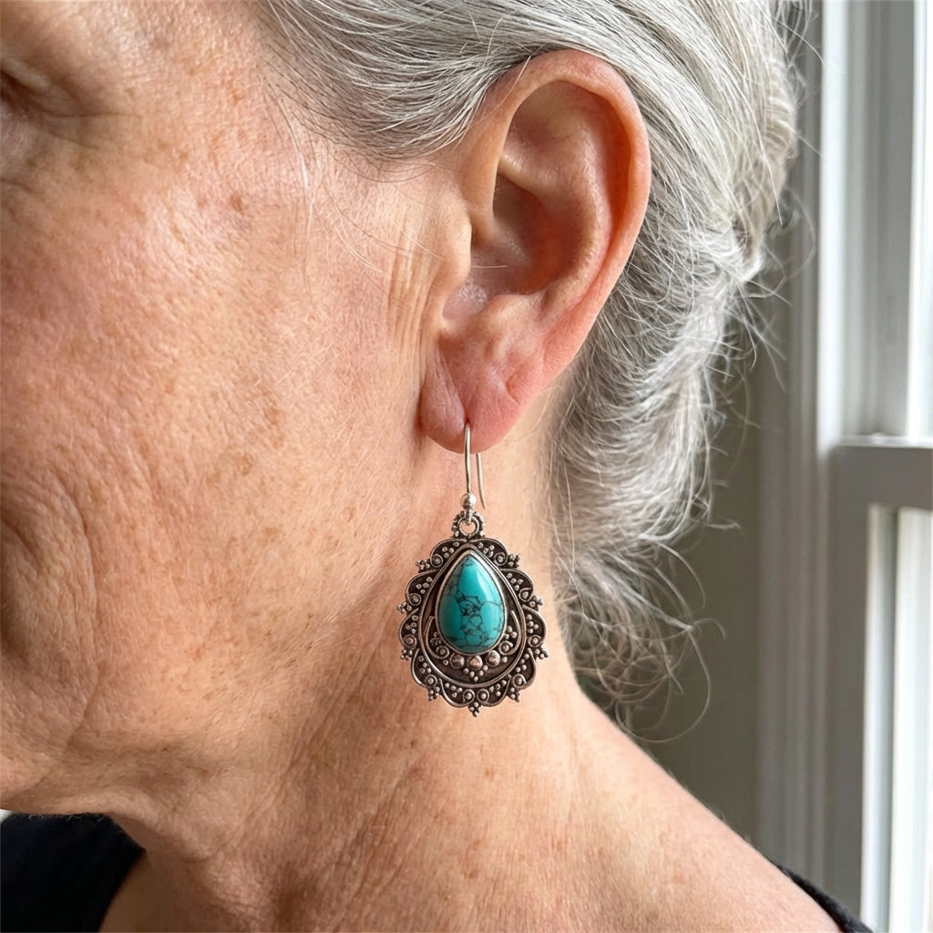 Zilveren vintage filigraan oorbellen met turquoise druppel