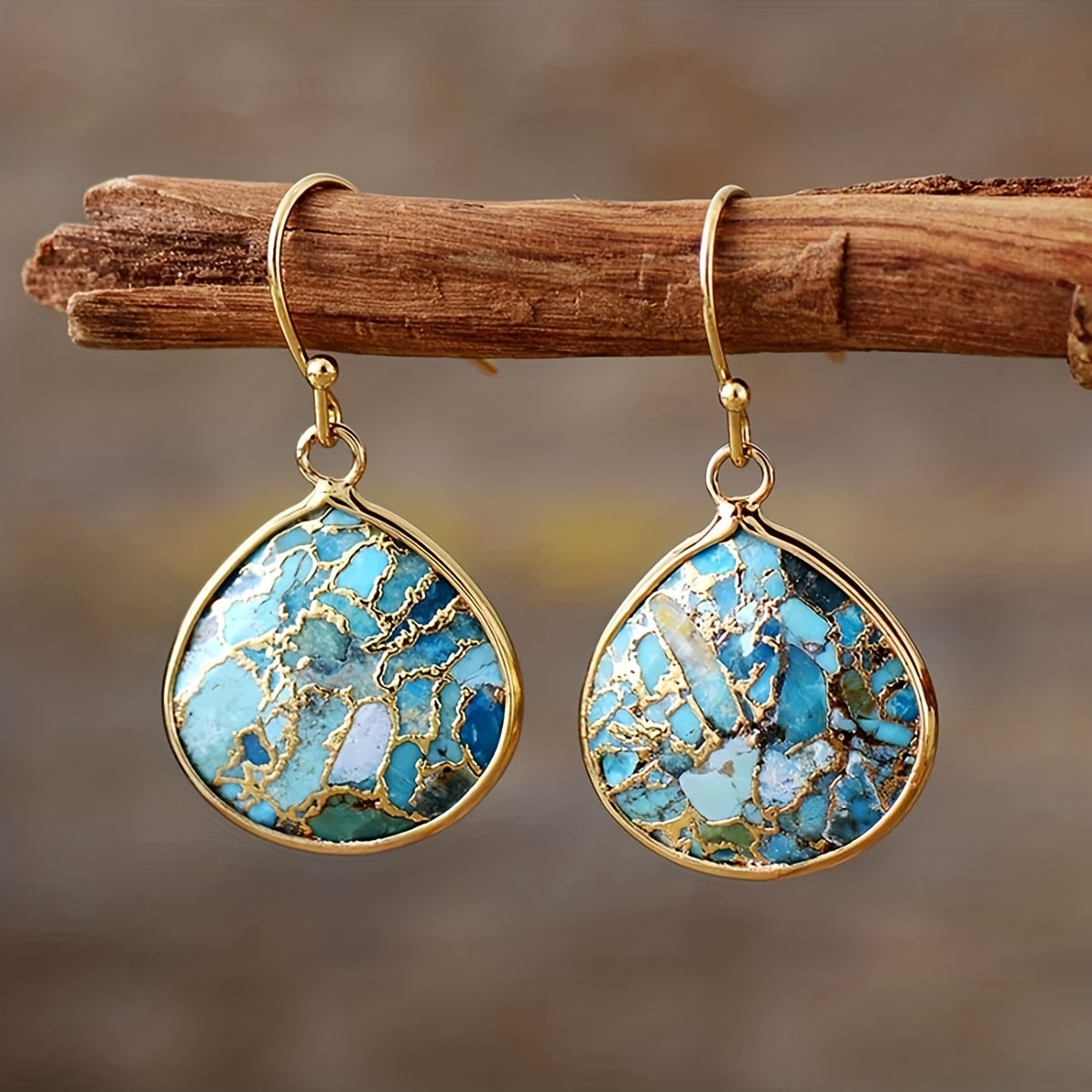 Gouden bohemian druppeloorbellen met turquoise mozaïek