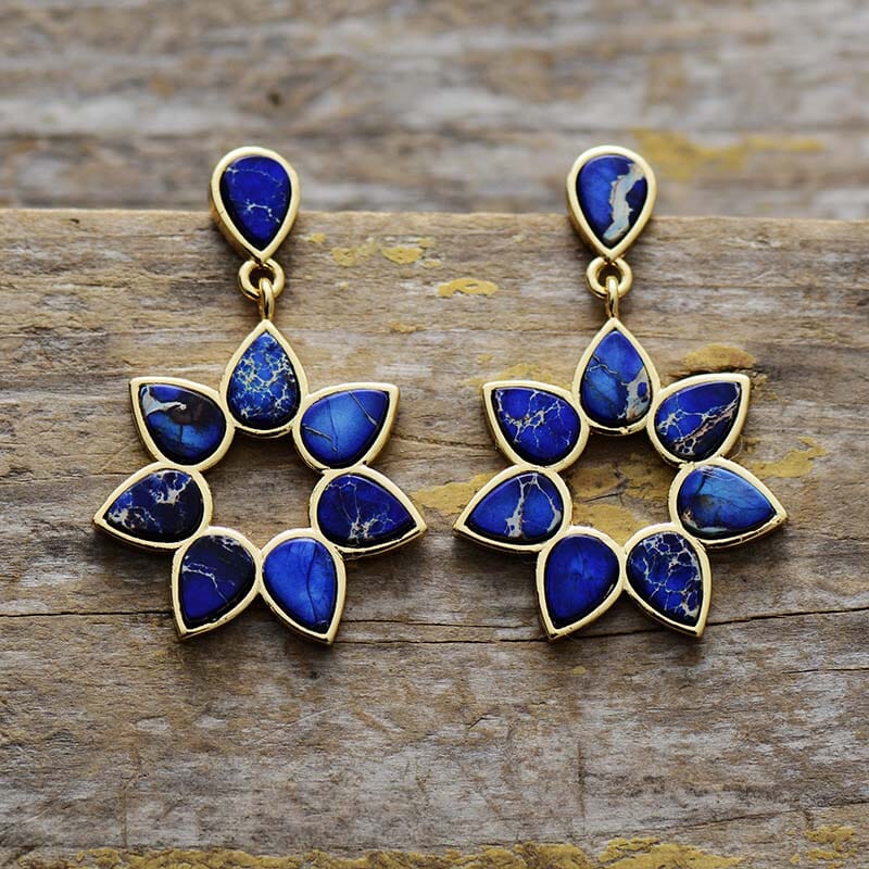 Gouden oorbellen met oranje jaspis bloem