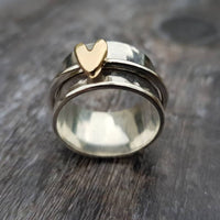 Zilveren ring met gouden hart
