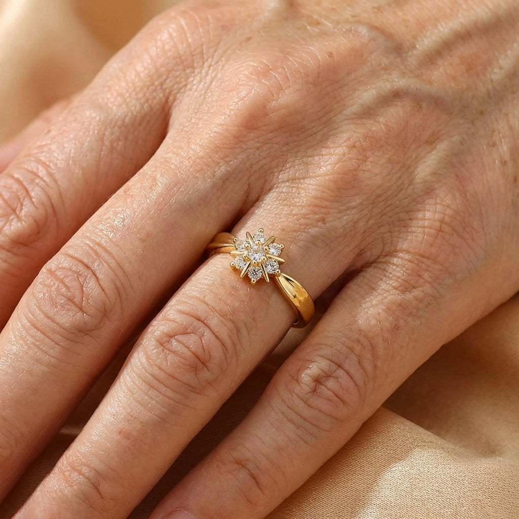 Gouden ring met zirkonia bloem en ster