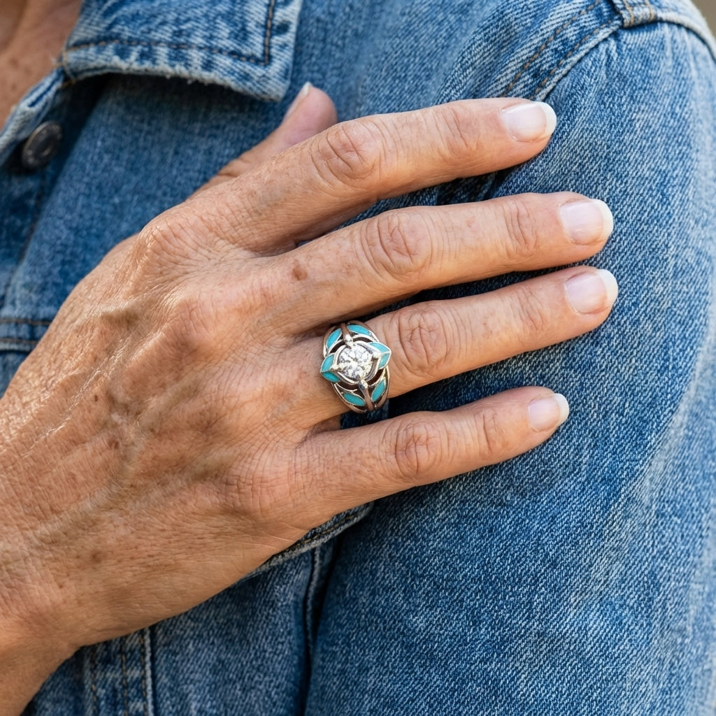 Zilveren ring met zirkonia en turquoise emaille blaadjes