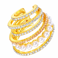 Gouden ring met parels en zirkonia in spiraalvorm