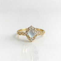 Gouden vintage ring met maansteen en zirkonia