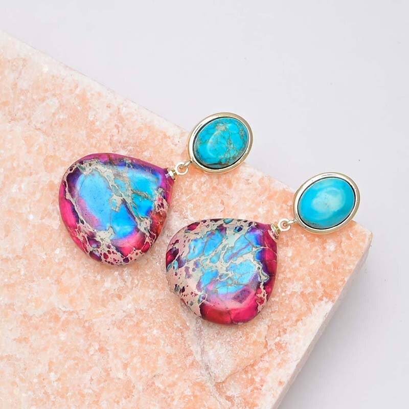 Gouden oorbellen met turkoois en roze-blauwe jaspis
