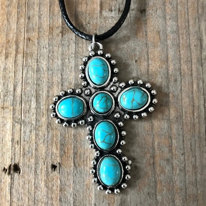 Bohemian zilveren ketting met turquoise kruishanger