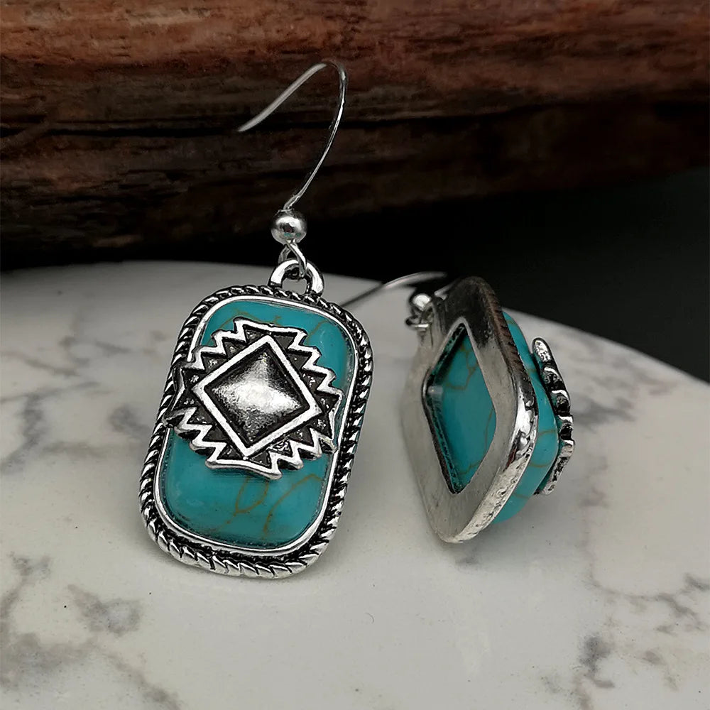 Bohemian zilveren oorbellen met turquoise en Azteeks motief